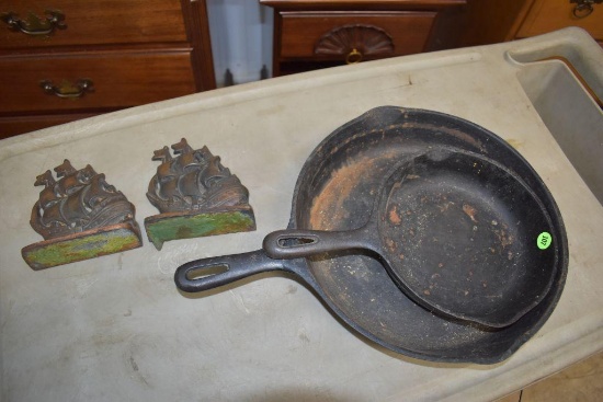 2 Cast Iron Frying Pans, 12" and 8", and 2 Bookends