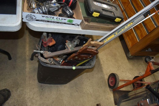 Basket full of Wood Saws & Wood Clamps