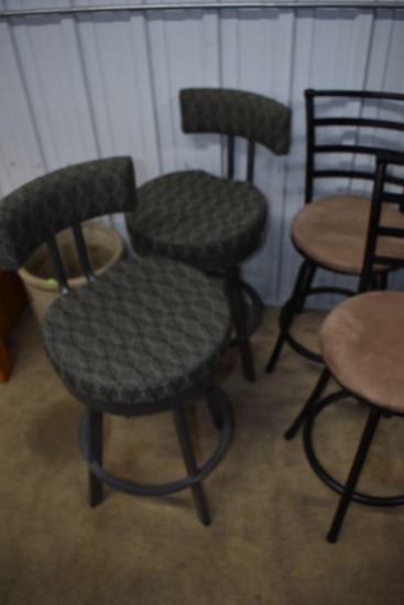 Two Metal frame padded swivel bar stools