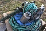 Gardenhose, gardenhose reel, tarp and watering can
