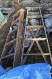 2 wooden stepladders and a tarp
