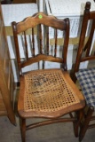 Wooden chair with cane bottom seat damage