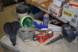 Electrical tape, racket straps, bike seat, thermal mug