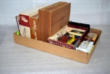 Assortment of toys, rain gauge, cigar boxes