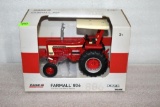 Ertl Farmall 806 with ROPS Tractor, 1/32nd scale, in box