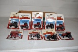 9 Ertl Farm Machines tractors and one implement on card