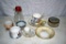 Porcelain dishes and glass nut grinder
