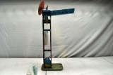 1950's Automatic Speedy-Hoist Tin Toy with Marbles