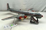 Tin Litho American Airlines 4 Engine Battery Operated DC7C Airplane, With Roll Up Boarding Steps,