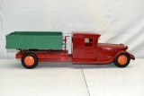 1930's Cor-Cor Toys Press Steel Dump Truck End Dump and Side Dump with battery powered headlights,