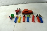 Assorted Pez Dispensers, Pressed Steel Car, Boattail Racer Wheelbarrow, Plastic Steam Shovel