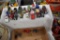 Assortment of beer advertising trucks and cars
