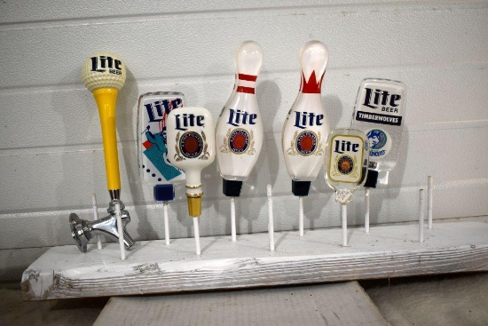 (7) Miller Lite Beer Tap Handle Markers, one with spout