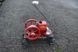 International Titan Junior 1 hp Dual Fuel Hit and Miss Engine on Steel Wheel Truck