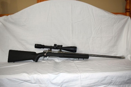 Remington Model 700 .223 Rem Cal., Stainless Steel Fluted Barrel, Composite Stock, with Burris