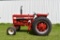 International Farmall 656, gas, restored, International wide front, K and M steps, open station