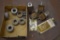 Box of assorted hydraulic stops, with rubber repair kit, truck box tie down loops, and two