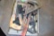 Pipe wrenches, wire brushes, and hand held saw