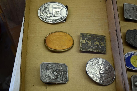 Five belt buckles, assorted pig attire