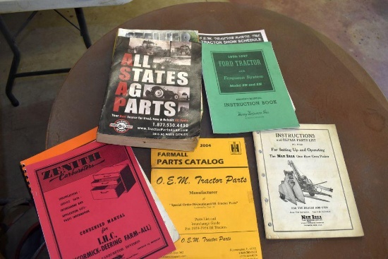 Assortment of equipment manuals and parts catalogs