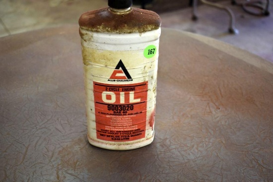 Allis Chalmers one quart plastic out board motor oil, half full