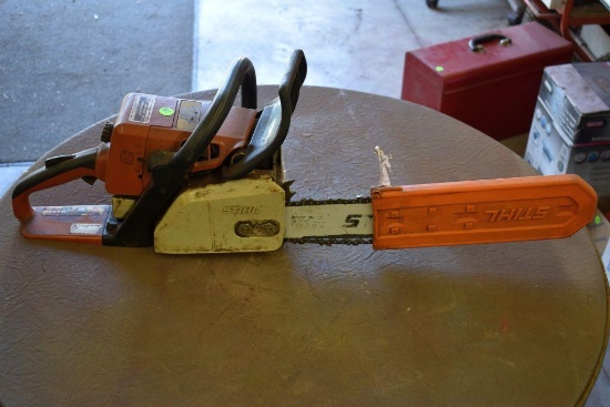 Stihl 021 gas powered chain saw with 16" bar and chain, motor is free