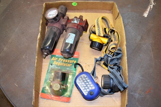 Box of air pressure regulators, two head lights and an led light with hook and magnet