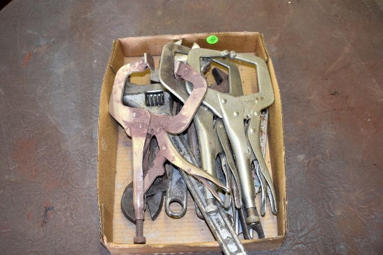 Assorted clamps and crescent wrenches