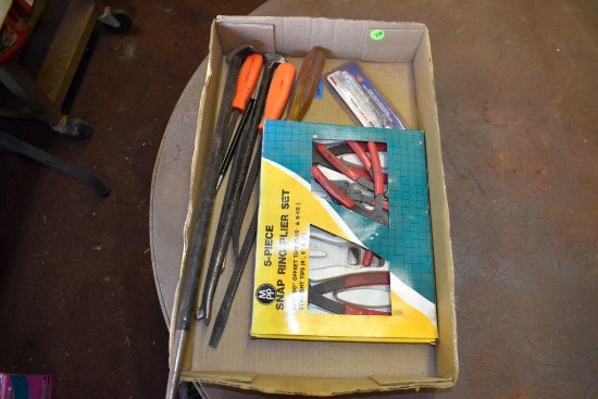 Assorted crow bars, five piece snap ring puller set, and a brand new 500 watt halogen bulb