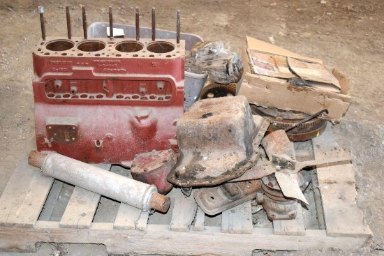 Various International 300 parts including crankshaft, block, and others