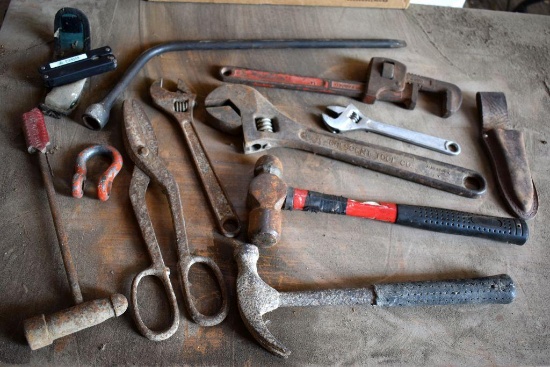 Hammer, crescent wrench, and pipe wrench