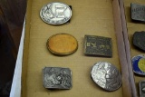 Five belt buckles, assorted pig attire