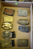 9 Belt buckles including , Budweiser, Buramount brass, Busch, Arcticat, Cobra radios , Playboy