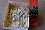 Assortment of wrenches and drill bits