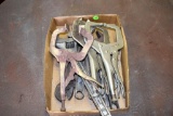 Assorted clamps and crescent wrenches