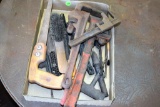Pipe wrenches, wire brushes, and hand held saw