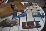Assortment Of Battery operated, Model Cars/Trucks All In Need Of Repair