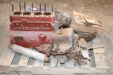 Various International 300 parts including crankshaft, block, and others