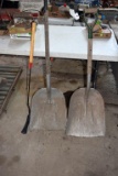 Two scoop shovels and a weed whacker