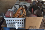 assortment of grease guns and electrical cords
