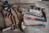 Hammer, crescent wrench, and pipe wrench