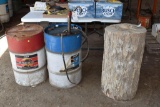 (2) 55 gallon barrels and large stump, 1 barrel has pump