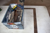 Hand saws, cement trowels and a square