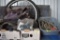 Bicycle gear, two tires on rims, 4 helmets, misc. parts