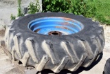 Tractor Tire On A Rim, 16.9-30, Tire Is Weather Checked