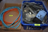 Box of two extension cords and box of electrical supplies of switches, plugs and more