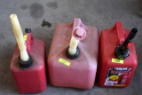 3 plastic gas cans