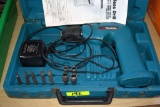Makita cordless drill Model 6041D with case, charger and bits - works