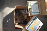 Box of knee pads, first aid kit, gloves
