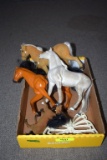 4 Plastic Horses and 1 Butterfly